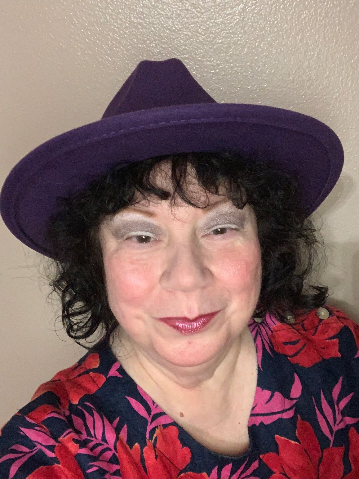 Portrait of Marilee Joy Mayfield in her purple hat
